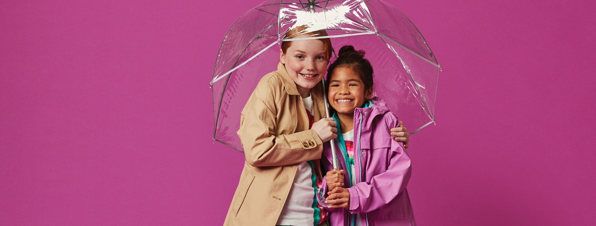 two girls with umbrella 
